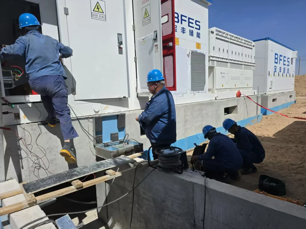 Wantai Electric technical team assembling an energy storage system at the Baofeng project site